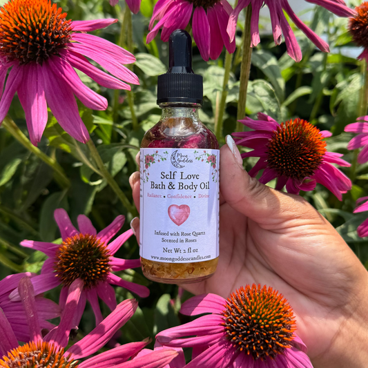 Glass dropper bottle filled with handcrafted love oil, infused with rose petals and herbs for attraction and romance rituals