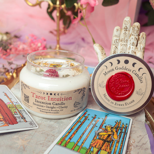 Tarot Intuition Intention Candle by Moon Goddess Candles, hand-poured in Brooklyn and infused with herbs and flowers, displayed alongside tarot cards and mystical decor for insight, clarity, and spiritual connection